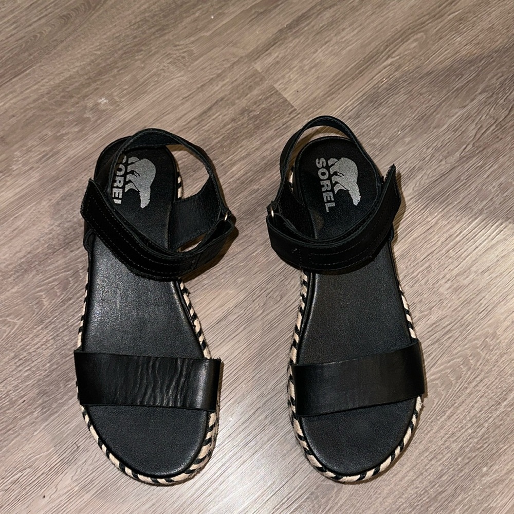 Sorel black sandals size 7.